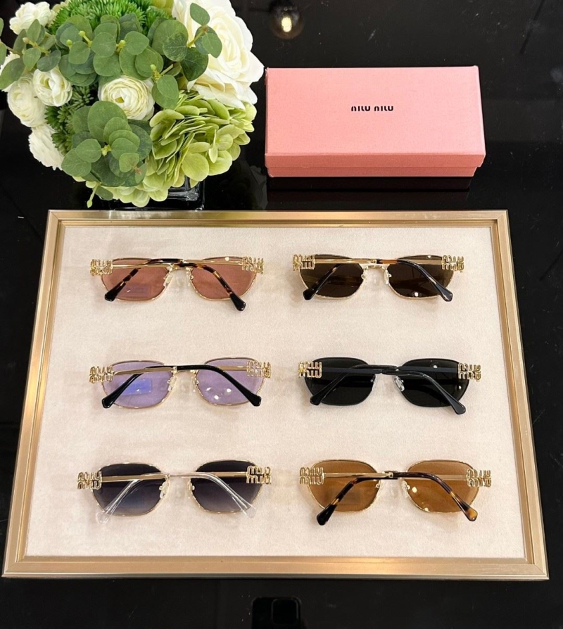 Miu miu Sunglasses